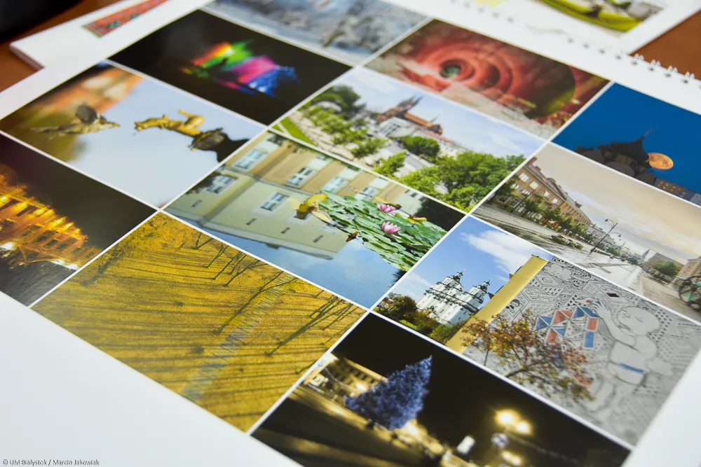Calendar pages laid out with the winning photos of Białystok across the seasons