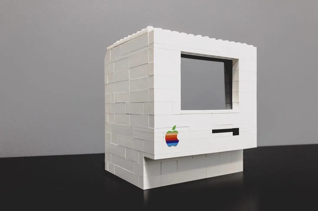 The white LEGO Macintosh case with an empty screen recess and the rainbow Apple logo